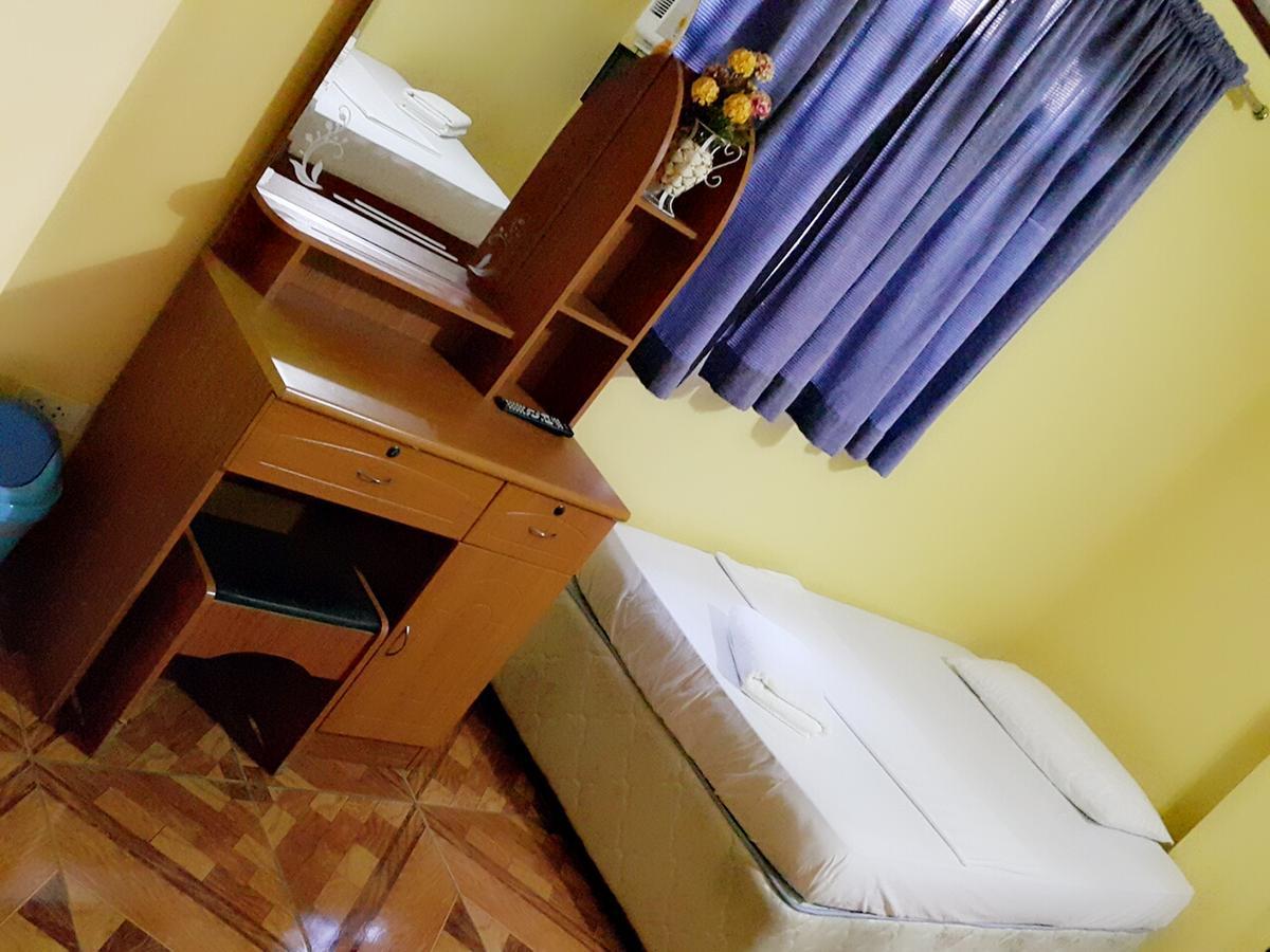 Bed and Breakfast Carribean Transient House Lucap Esterno foto