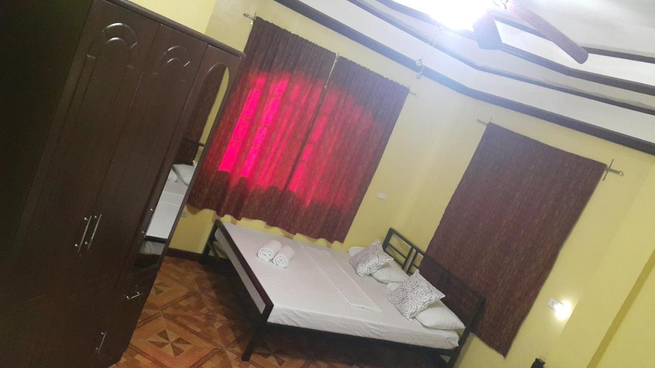 Bed and Breakfast Carribean Transient House Lucap Esterno foto